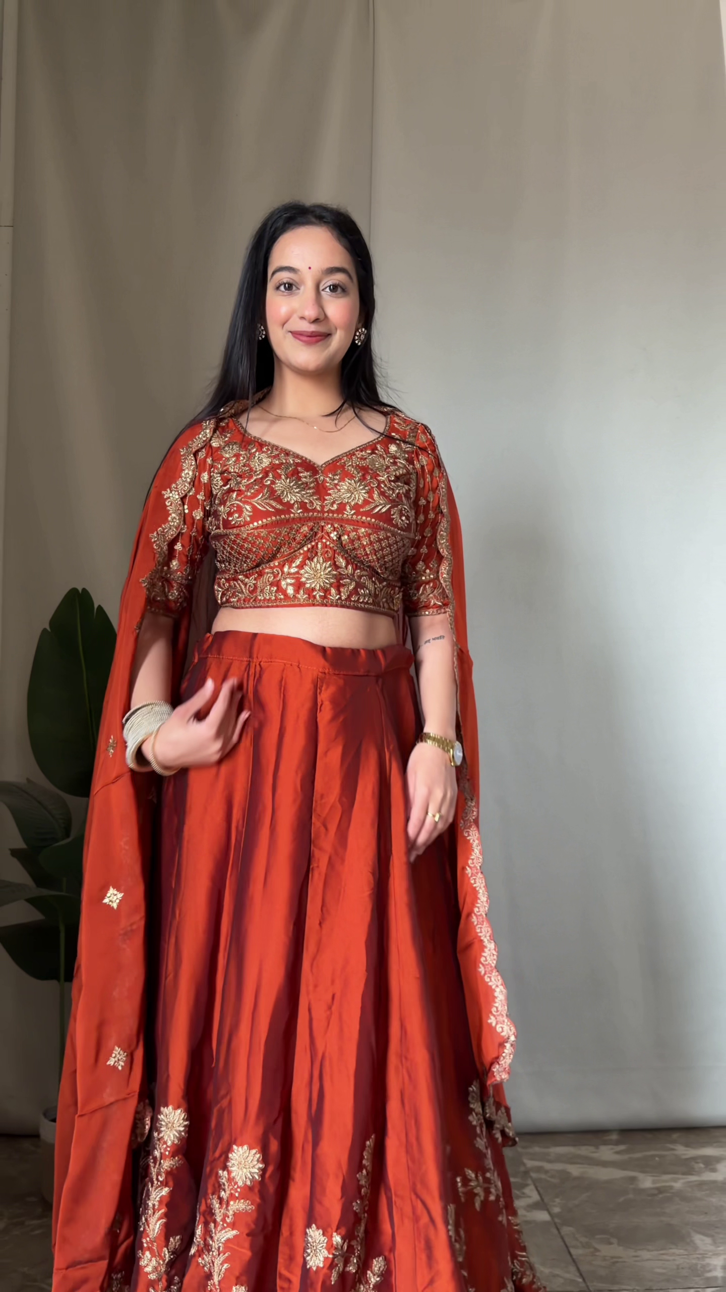 Regal Rust Embroidered Lehenga Set with Golden Detailing