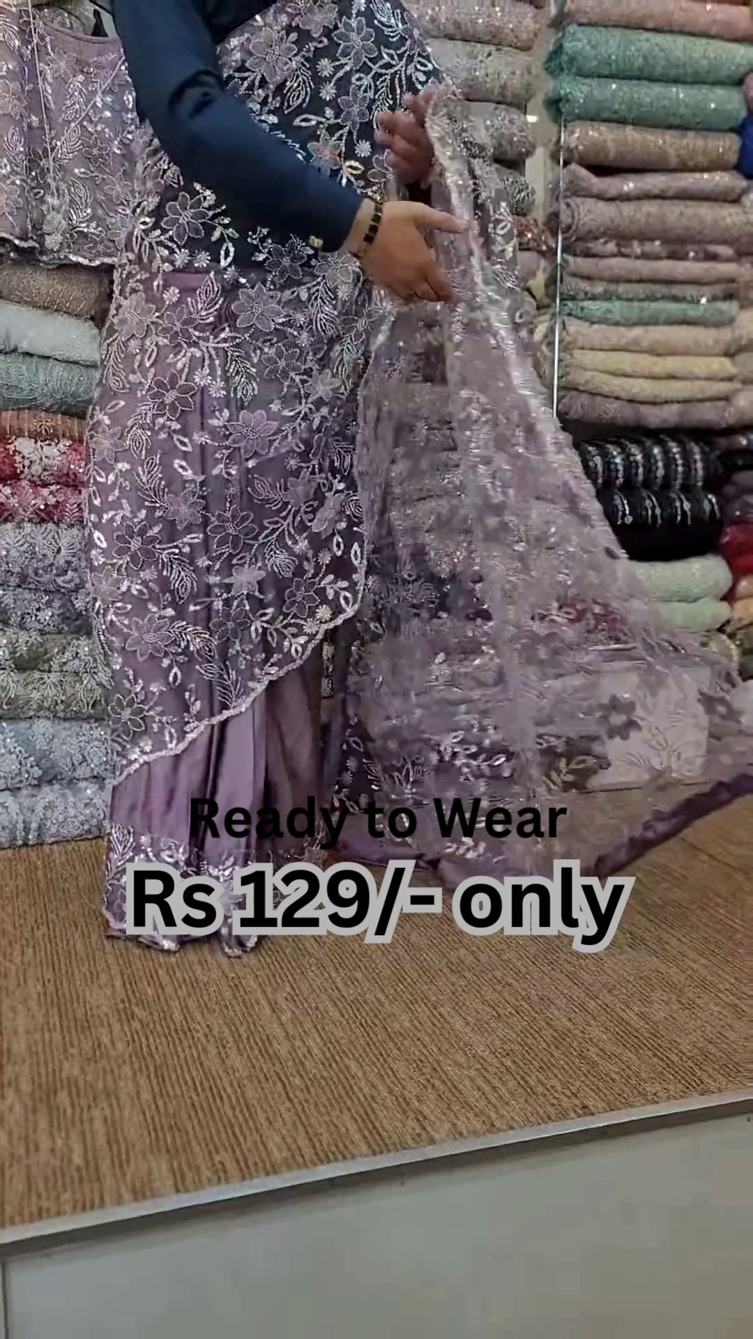 Elegant Purple Net Saree with Intricate Design